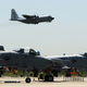 A-10 Warthogs from the 111th Fighter Wing are seen in the foreground as a U.S. Navy C-130 takes off from N.A.S. J.R.B. Willow Grove, Friday, May 13, 2005, in Willow Grove, Pa. (AP Photo/Joseph Kaczmarek)